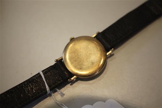 A gentlemans 1950s 9ct gold J.W. Benson manual wind wrist watch,